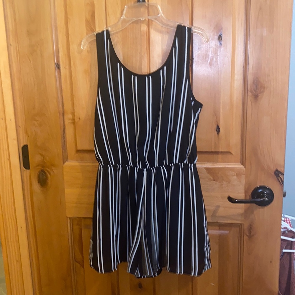 Black romper with white stripes